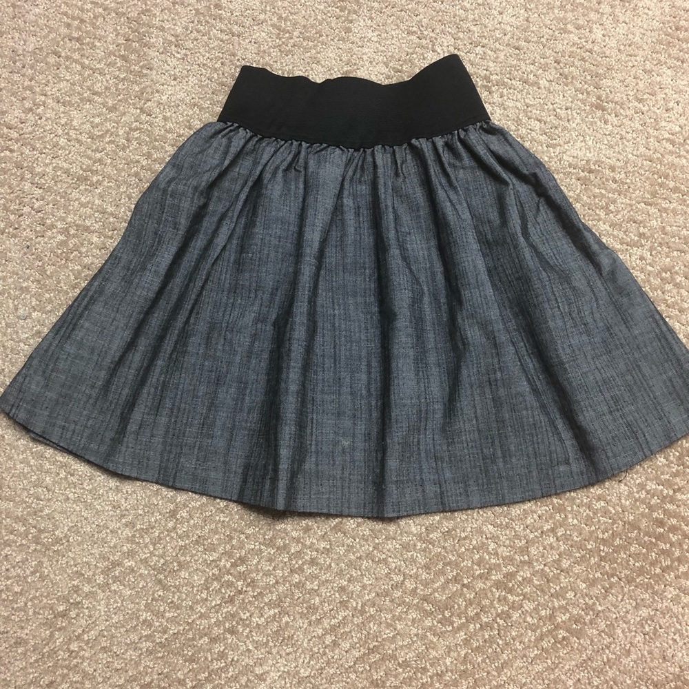 Grey pleated skirt with black high waist band